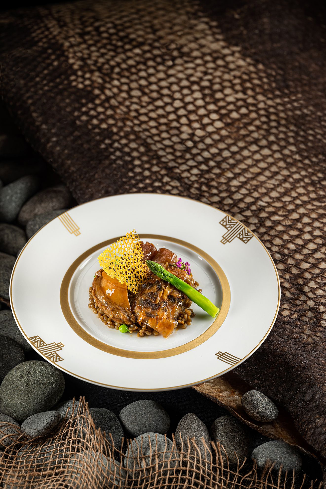 Braised Deer Sinew with Australia Abalone, Giant Grouper Skin and Rock Rice in Superior Sauce