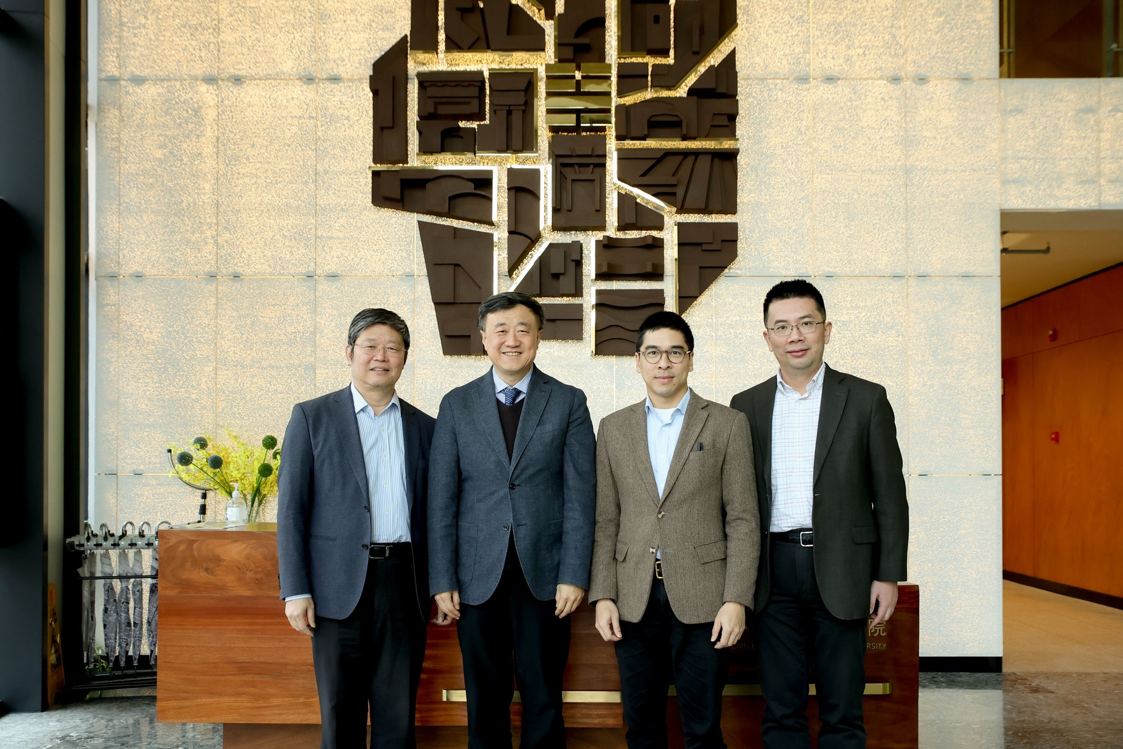 Mr. Adriel Chan, Vice Chair of Hang Lung Properties and Chair of the Sustainability Steering Committee (second right), Professor Yang Bin, Vice President of Tsinghua University and Joint Director of the Management Committee of The Hang Lung Center for Real Estate at Tsinghua University (second left), Professor Liu Hongyu, Deputy Director of the Management Committee of The Hang Lung Center for Real Estate at Tsinghua University (first left), and Professor Wu Jing, Director of The Hang Lung Center for Real Estate at Tsinghua University (first right)