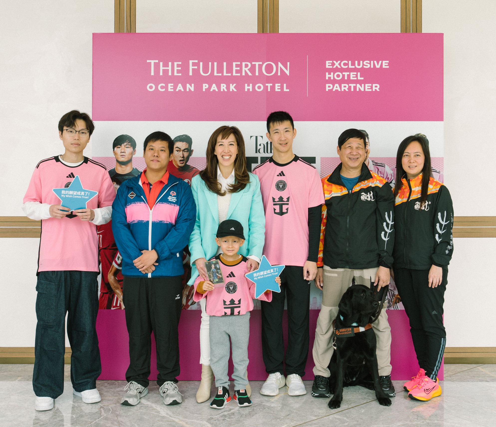 Group photo of Ms Nikki Ng (third from the left), So Wah Wai (third from the right), Lee Ho Yung (second from the left), Kim Mok (second from the right) and Yim Wai Yan Veronica (Rightmost), and Make-A-Wish Hong Kong's wish kids.