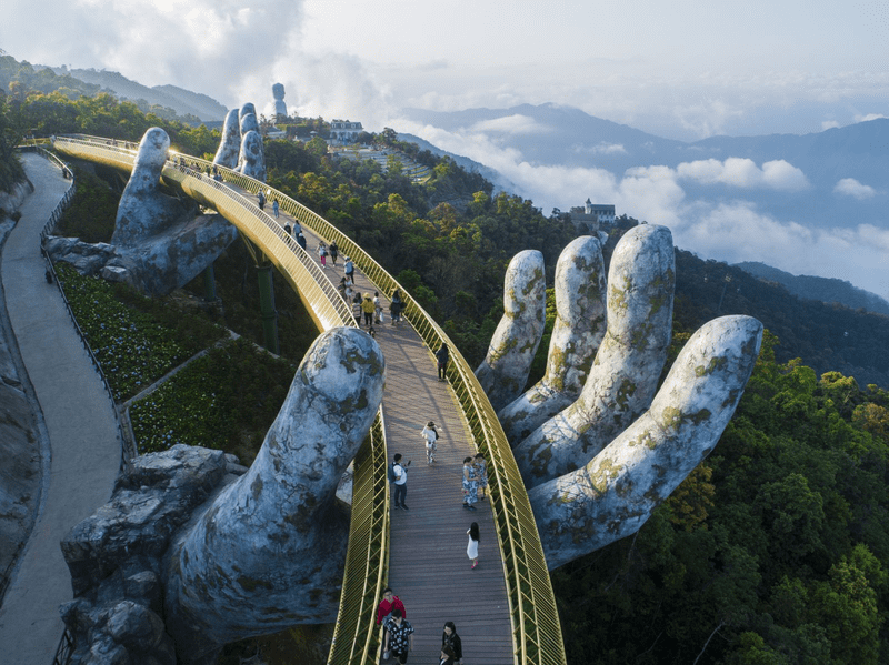 The Golden Bridge gracefully curves like a silk ribbon at Ba Na Hills.