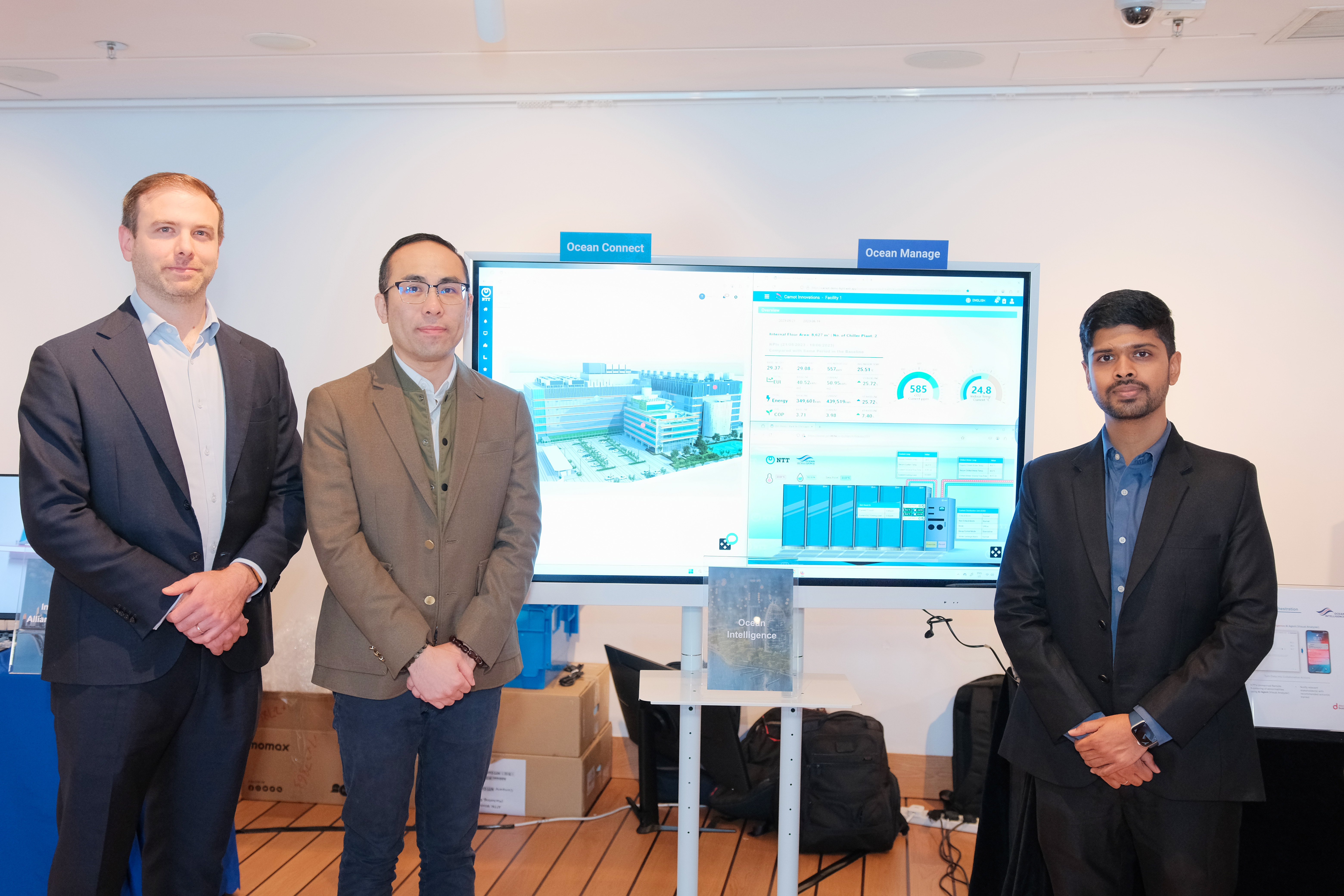 Phil McManus, Director, Business Innovations, NTT Com Asia (left), Jackie Yuen, Senior Director, System Design & Architecture, NTT Com Asia (middle), and Ashish Jerry Justin, Co-founder and CEO, Carnot Innovations (right) showcase the NTT OCEAN Intelligence™ and the Chiller Plant Energy Optimization, powered by Carnot Innovations.