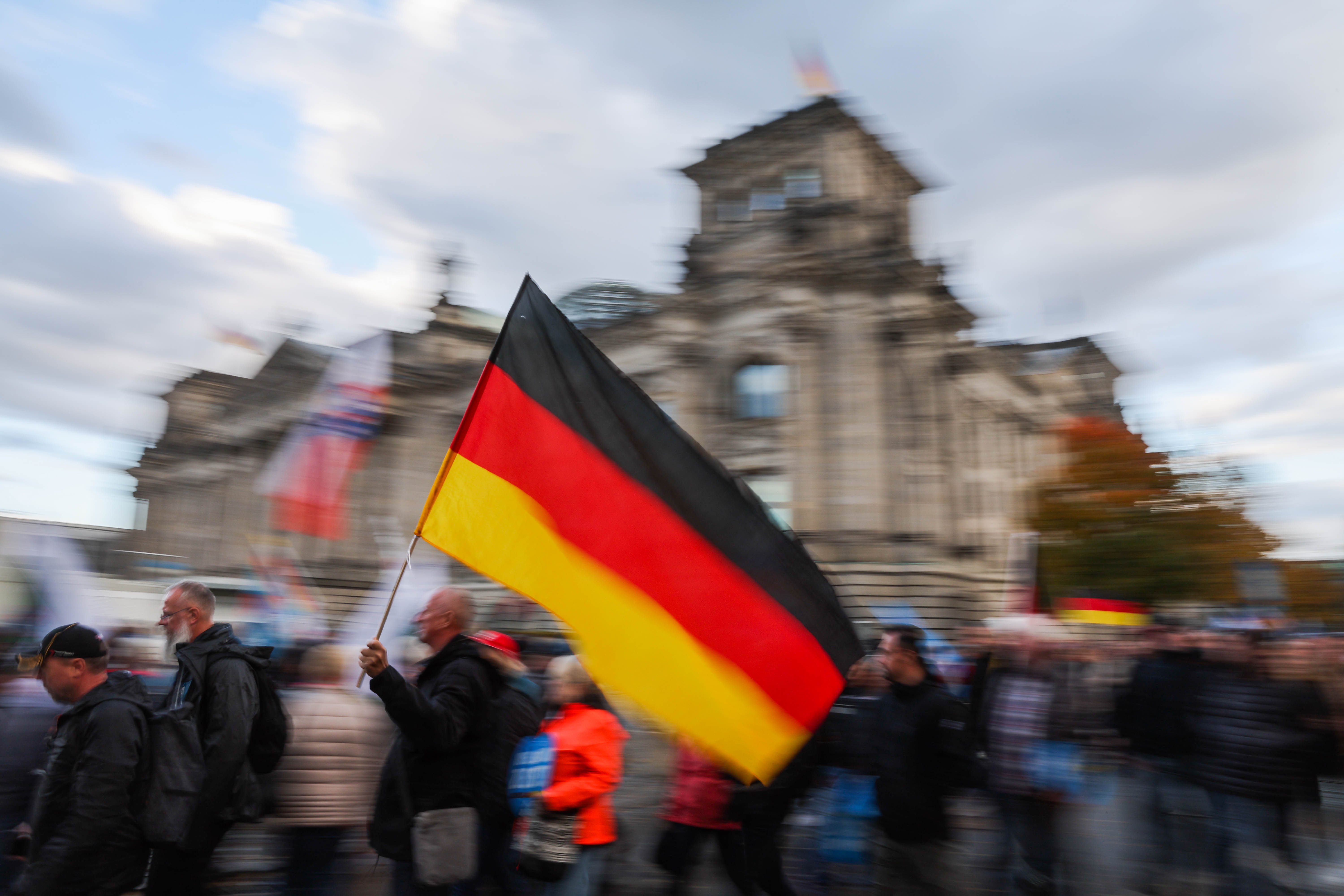 On February 23, Germany elects a new Bundestag. The issue of migration plays a particularly important role, not least for supporters of the far-right AfD party - seen here at a demonstration in front of the Reichstag building in Berlin, the seat of the Bundestag, in 2022. (Photo by Christoph Soeder/dpa)