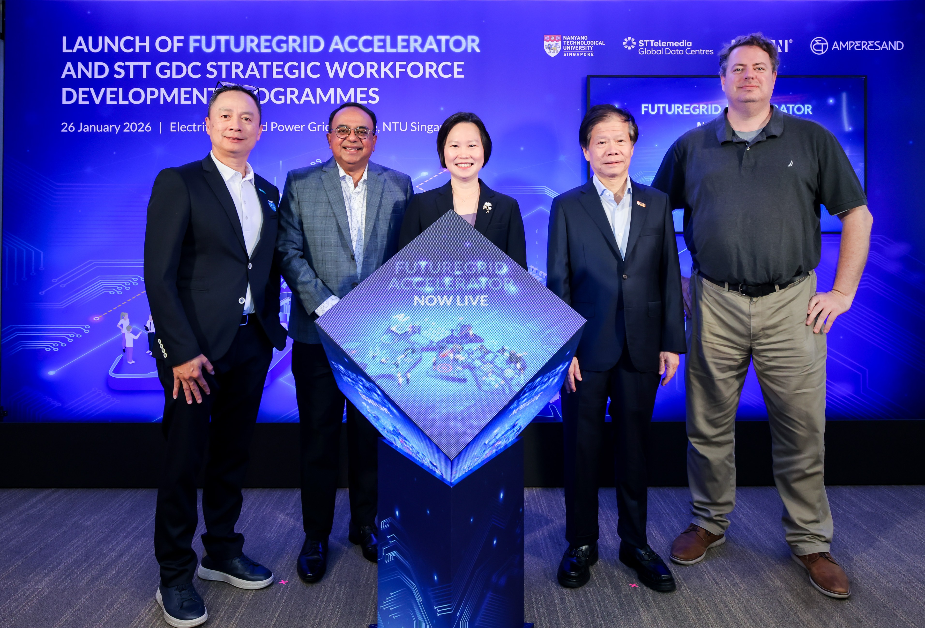Celebrating the official launch of the FutureGrid Accelerator; a new benchmark for HVDC-powered AI infrastructure in the region. [Pictured from left to right] Lim Kian Tiong, Chief Financial Officer, LITEON; Bruno Lopez, President & Group Chief Executive Officer, ST Telemedia Global Data Centres; Minister Gan Siow Huang, Minister of State, Ministry of Foreign Affairs & Ministry of Trade and Industry; Professor Lam Khin Yong, Vice President (Industry), Nanyang Technology University Singapore; Brian Dow, Chief Executive Officer, Amperesand.