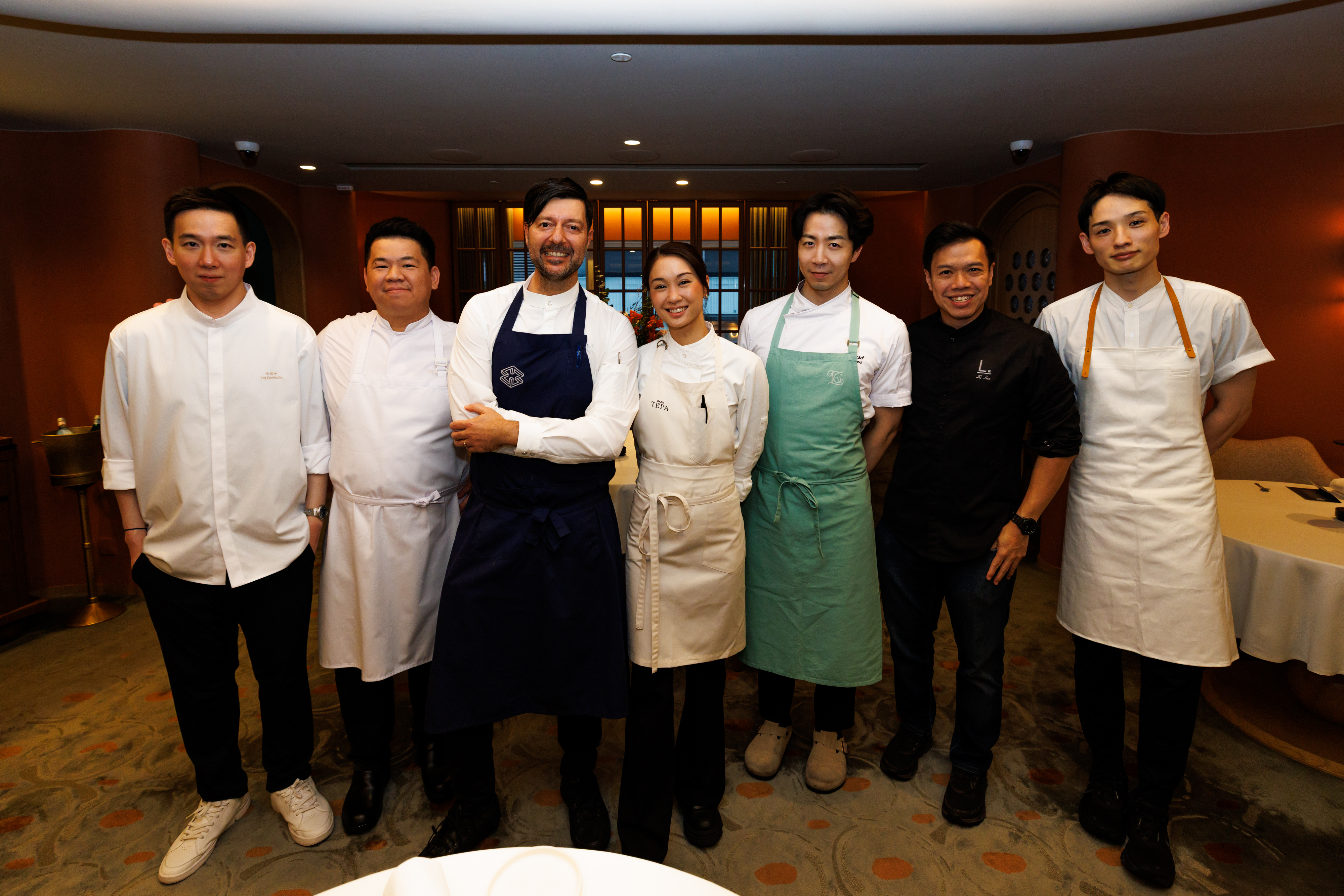 From left, representatives from restaurants Estro, Baan Tepa, Born, Labyrinth, Eatanic Garden, Crony and Gaggan collaborate at one of several Signature Sessions.