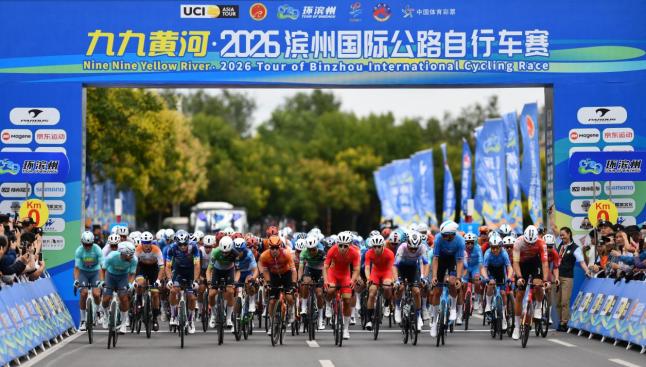 Riders surge from the starting line as the race gets underway along the Yellow River course.