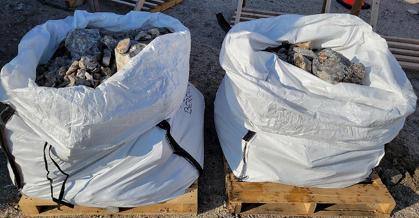 Figure 3: Bulk tonnage bags of pollucite pegmatite sample composites ready for shipping to the lab (see Table 1).